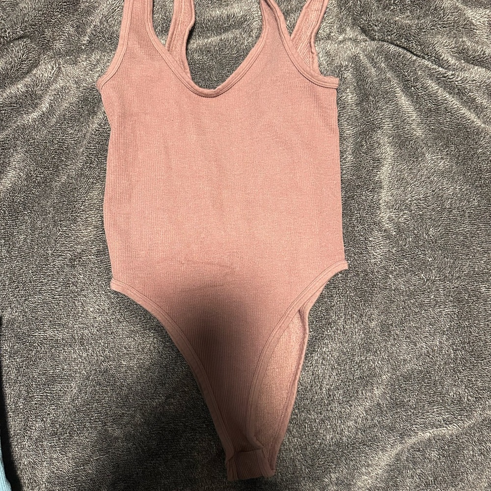 Women’s pink bodysuit